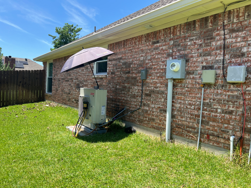 Colorful playground with spiral slide at Slayter Creek Park in Anna, TX on a sunny day.