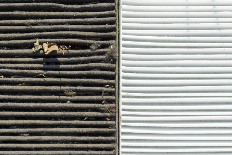 Side-by-side comparison of a dirty and clean HVAC filter used in fall maintenance for Celina, Texas homeowners.